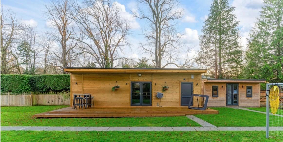 Completed golf simulator room exterior with decking — Crowthorne Construction, Berkshire