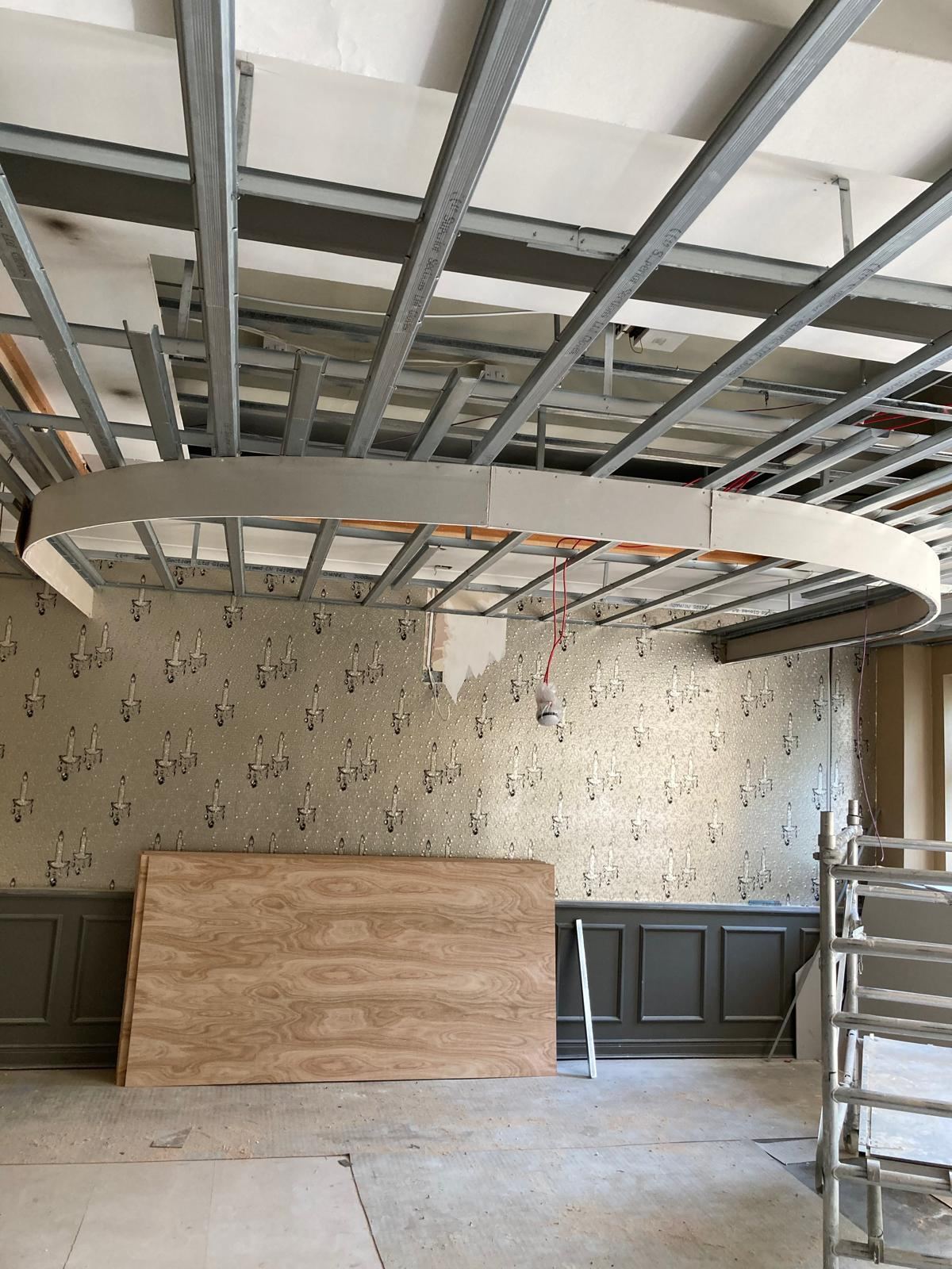 Hotel bar ceiling framework being installed — Crowthorne Construction