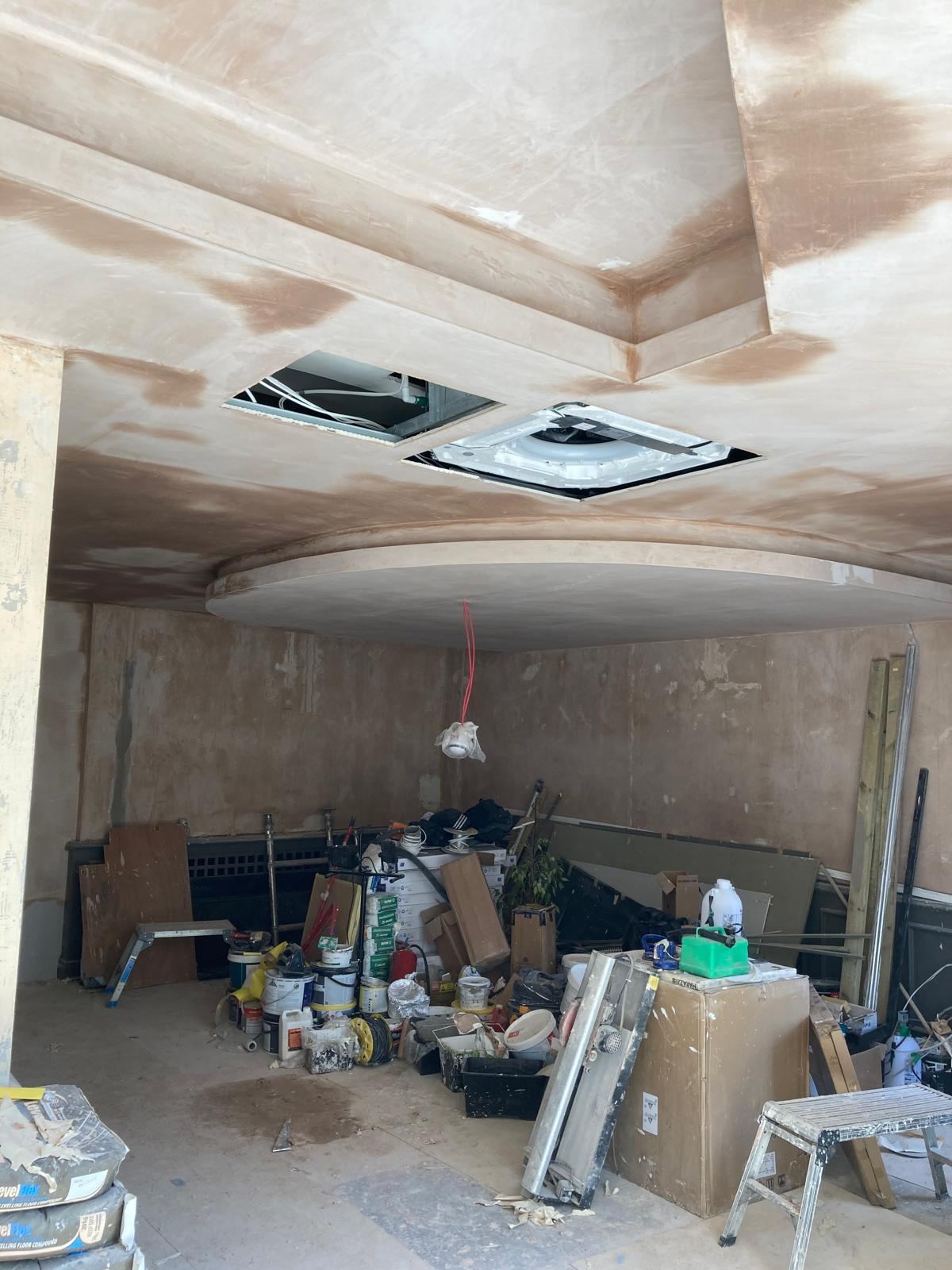 Hotel bar ceiling plastering in progress — Crowthorne Construction