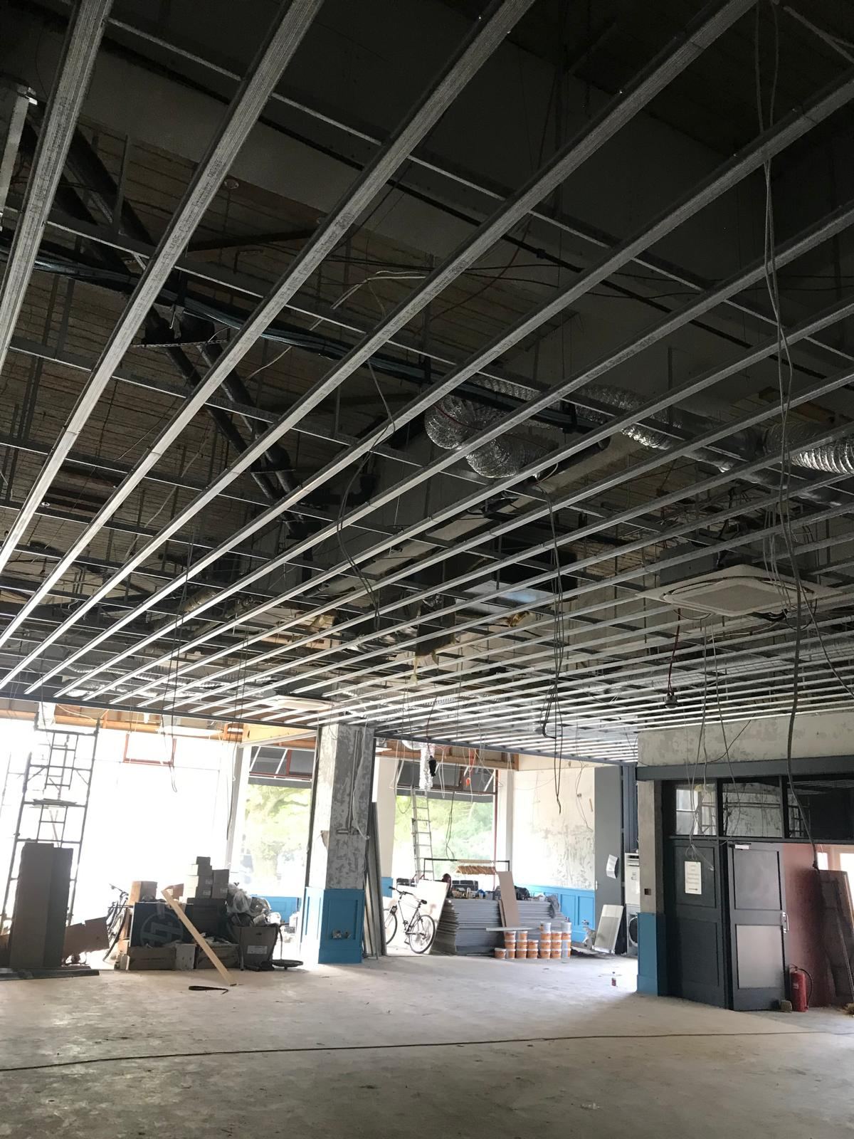Hotel dining room steel ceiling grid — Crowthorne Construction
