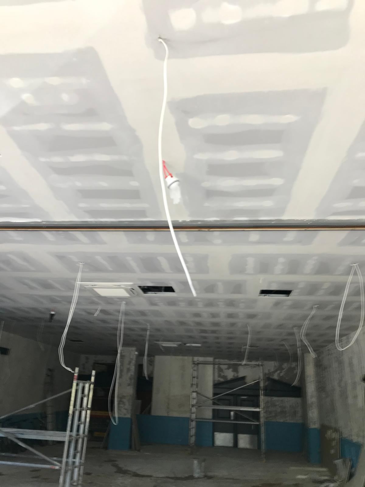 Hotel dining room drylining ceiling in progress — Crowthorne Construction